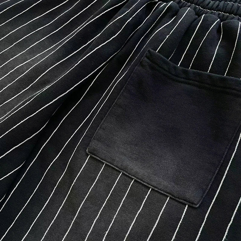 Vertabrae sweatpants with holes and classic vertical casual trousers